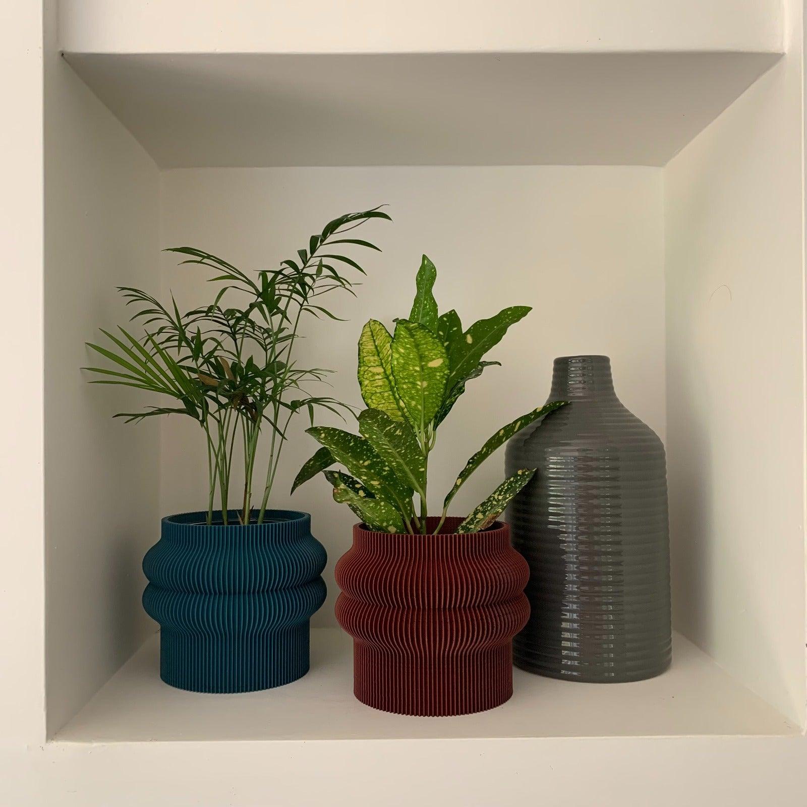 Mooie - Vaso elegante e sostenibile, realizzato in 100% PLA biodegradabile, stampato in 3D e Made in Italy. Il suo design raffinato ed ecologico aggiunge un tocco di stile e sostenibilità a qualsiasi ambiente.