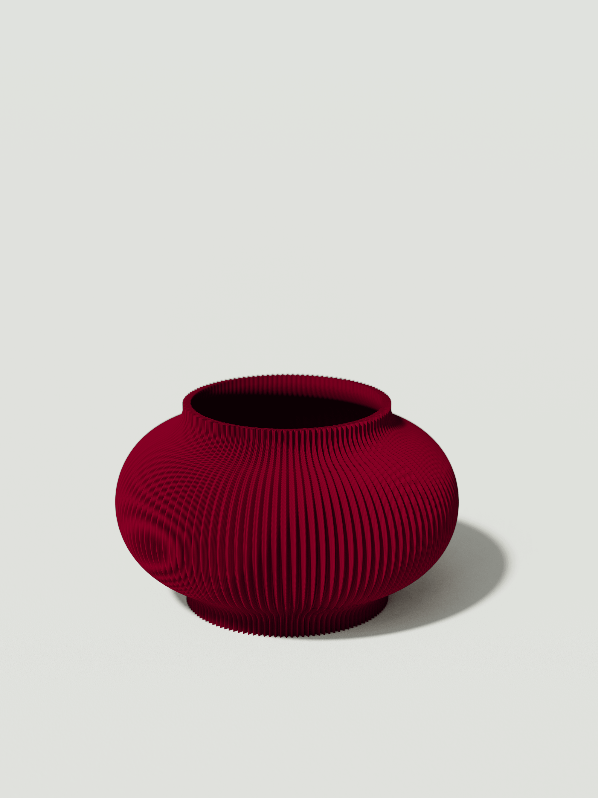 Bao - Vaso elegante e sostenibile, realizzato in 100% PLA biodegradabile, stampato in 3D e Made in Italy. Il suo design raffinato ed ecologico in bordeaux aggiunge un tocco di stile e sostenibilità a qualsiasi ambiente.