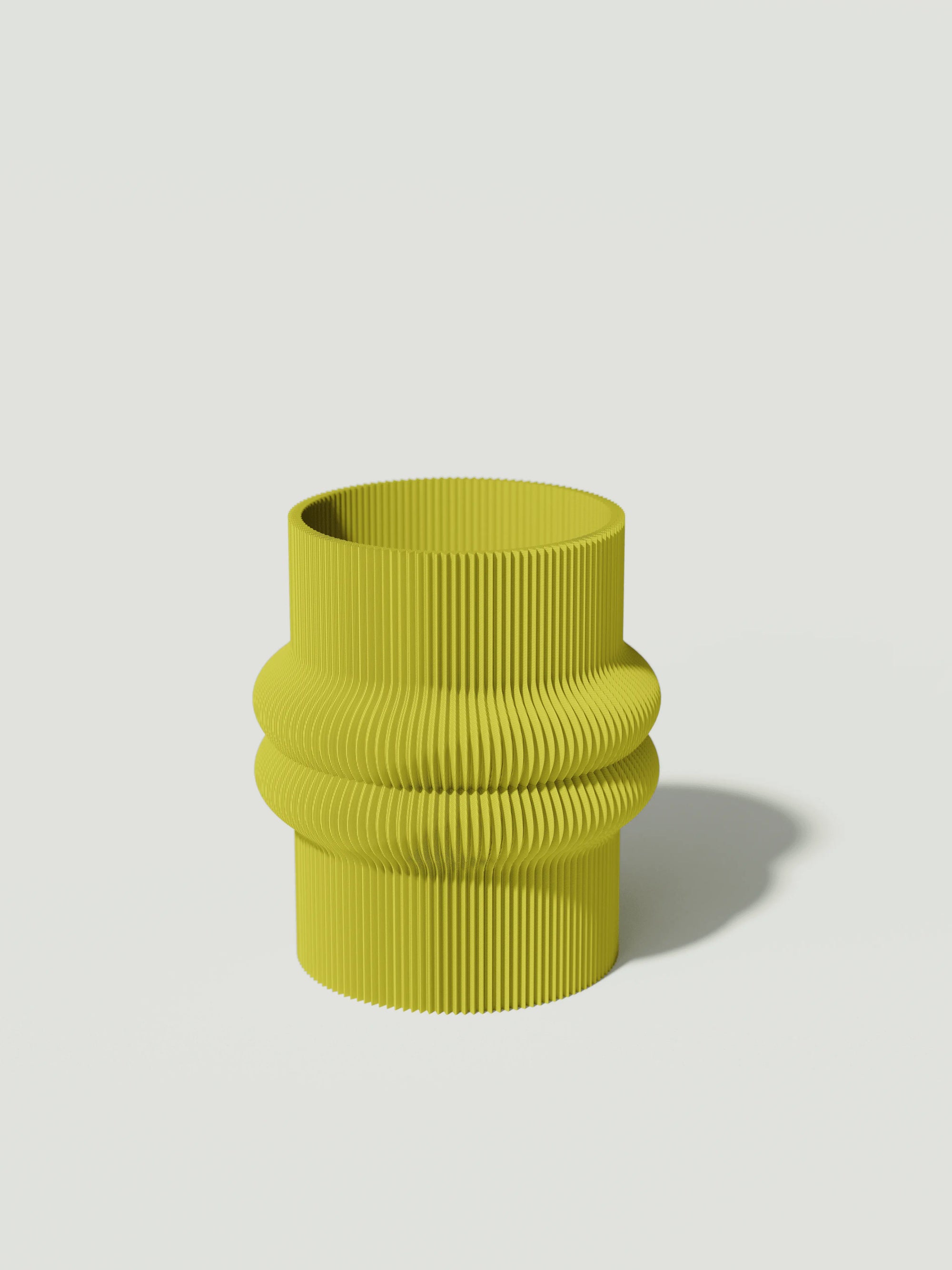 Mooi - Vaso elegante e sostenibile, realizzato in 100% PLA biodegradabile, stampato in 3D e Made in Italy. Il suo design raffinato ed ecologico in giallo aggiunge un tocco di stile e sostenibilità a qualsiasi ambiente.
