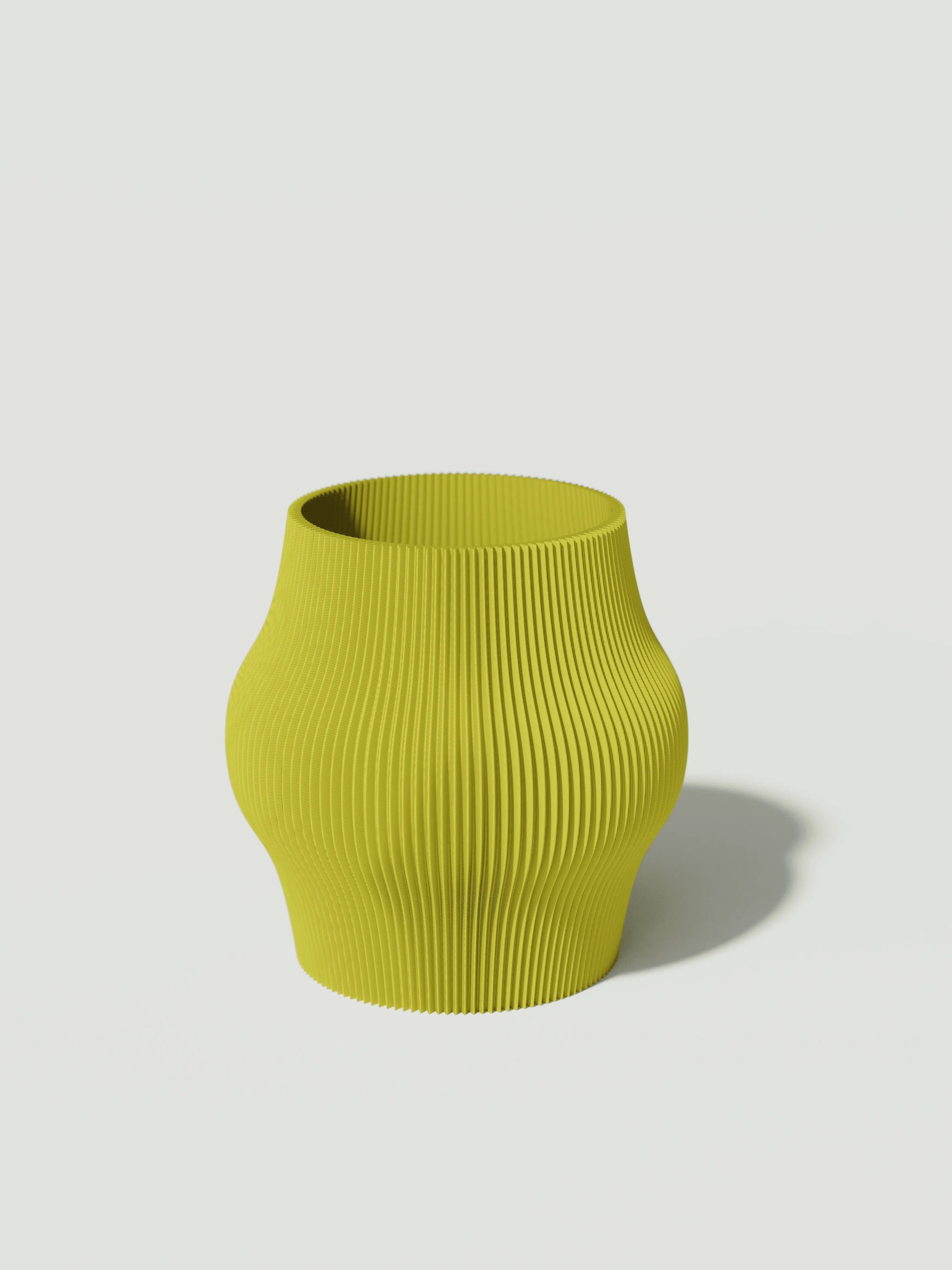Gordo - Vaso elegante e sostenibile, realizzato in 100% PLA biodegradabile, stampato in 3D e Made in Italy. Il suo design raffinato ed ecologico in giallo aggiunge un tocco di stile e sostenibilità a qualsiasi ambiente.