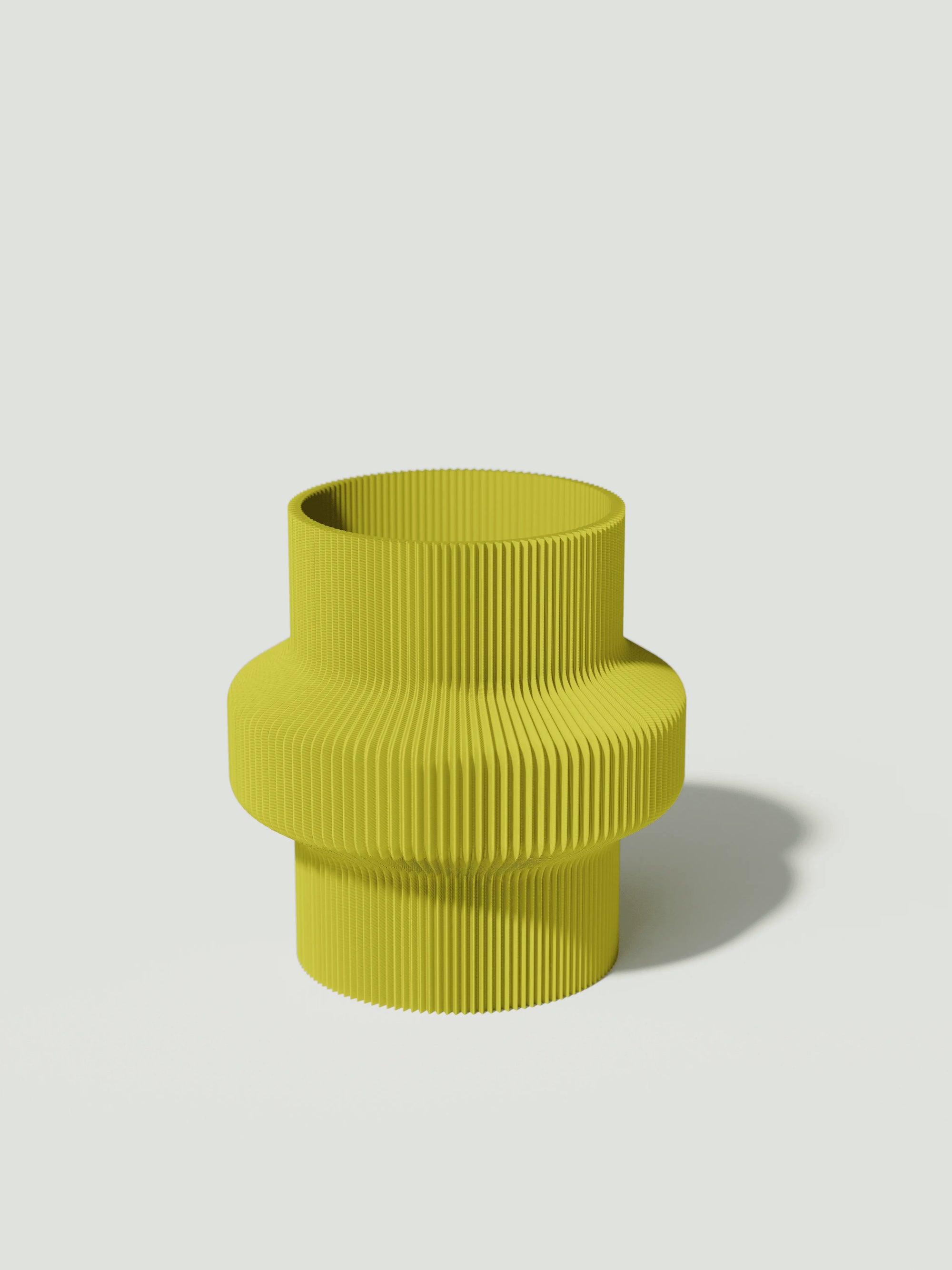 Tuc - Vaso elegante e sostenibile, realizzato in 100% PLA biodegradabile, stampato in 3D e Made in Italy. Il suo design raffinato ed ecologico in giallo aggiunge un tocco di stile e sostenibilità a qualsiasi ambiente.