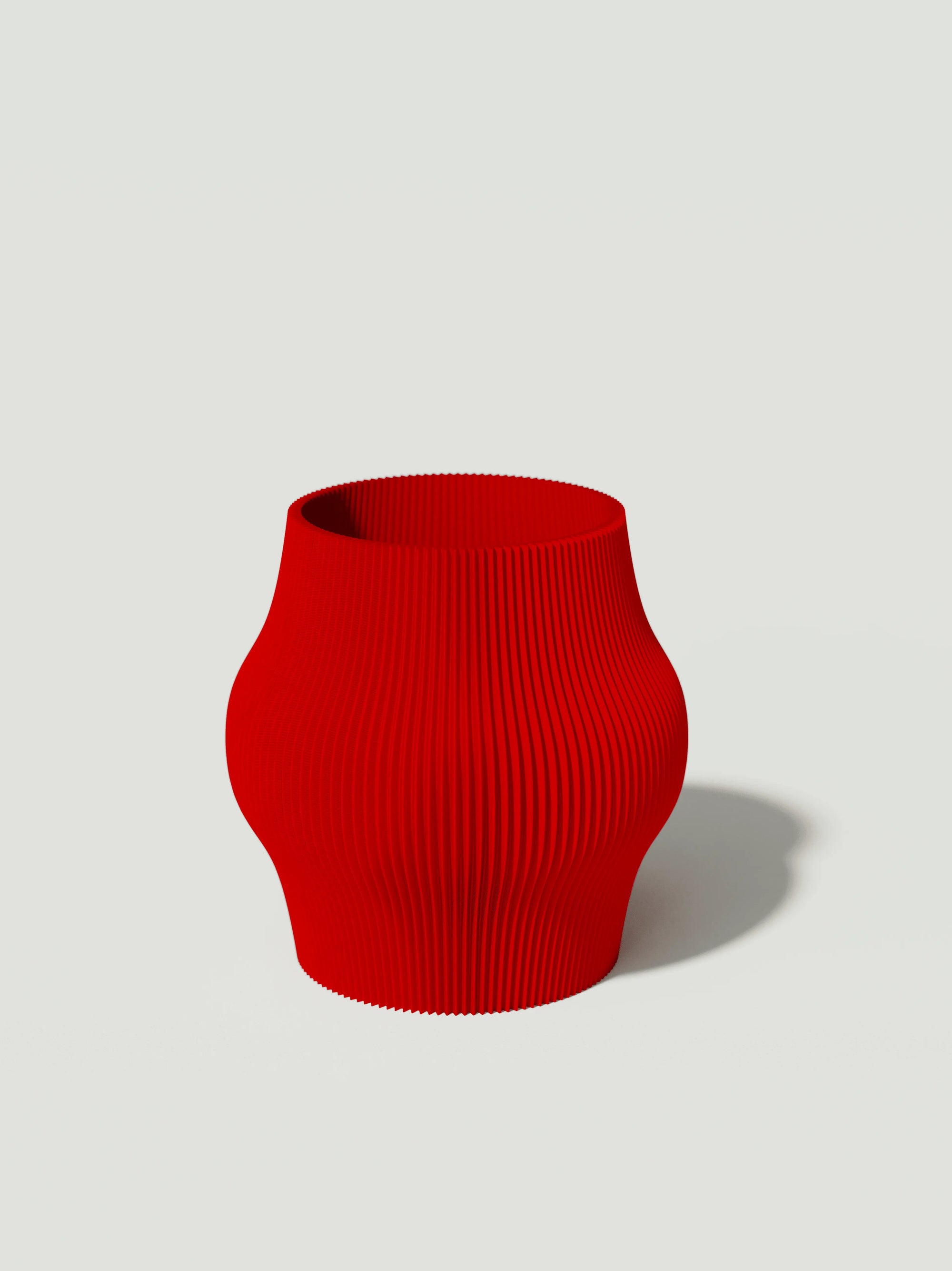 Gordo - Vaso elegante e sostenibile, realizzato in 100% PLA biodegradabile, stampato in 3D e Made in Italy. Il suo design raffinato ed ecologico in rosso aggiunge un tocco di stile e sostenibilità a qualsiasi ambiente.
