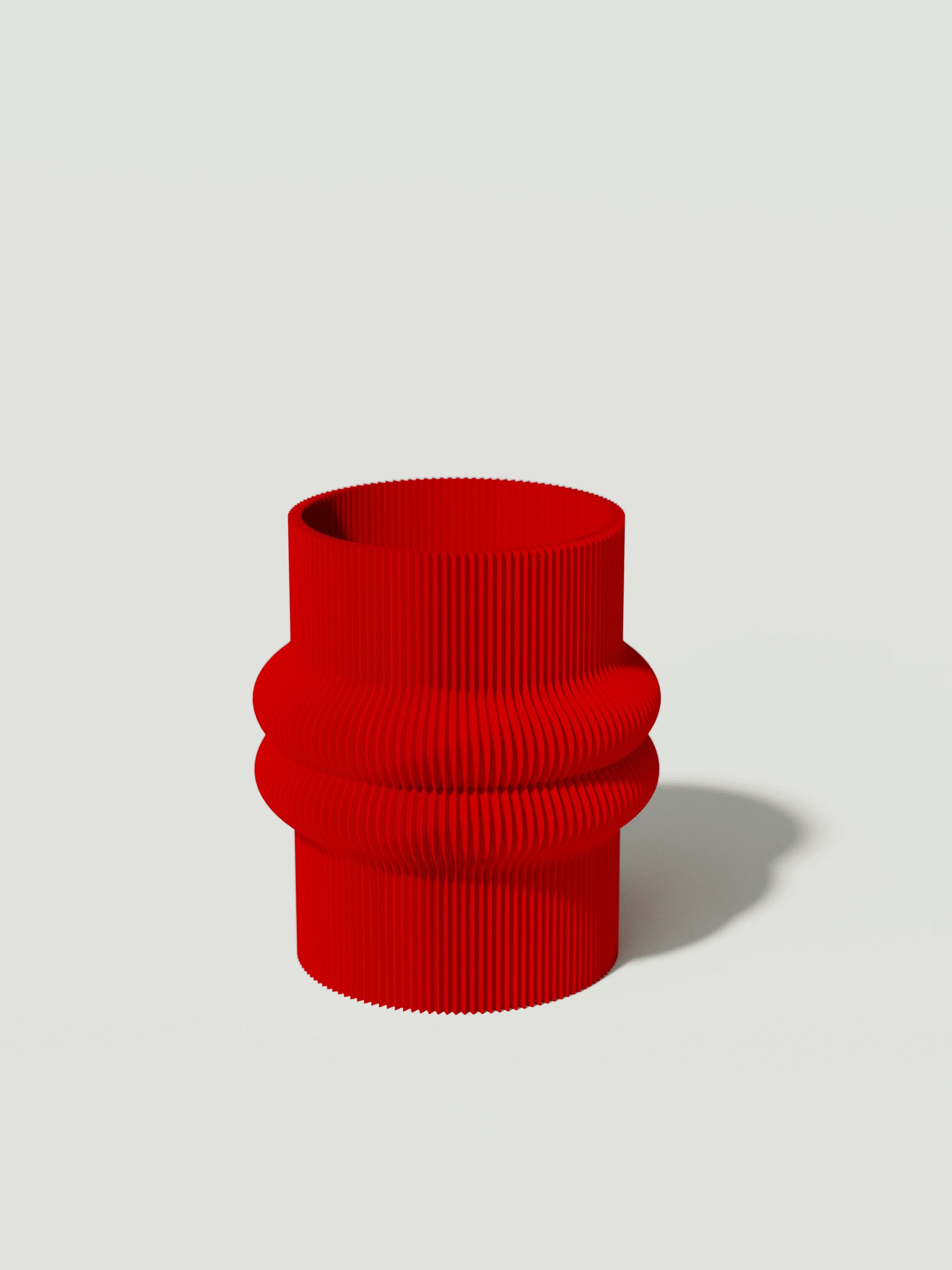 Mooi - Vaso elegante e sostenibile, realizzato in 100% PLA biodegradabile, stampato in 3D e Made in Italy. Il suo design raffinato ed ecologico in rosso aggiunge un tocco di stile e sostenibilità a qualsiasi ambiente.