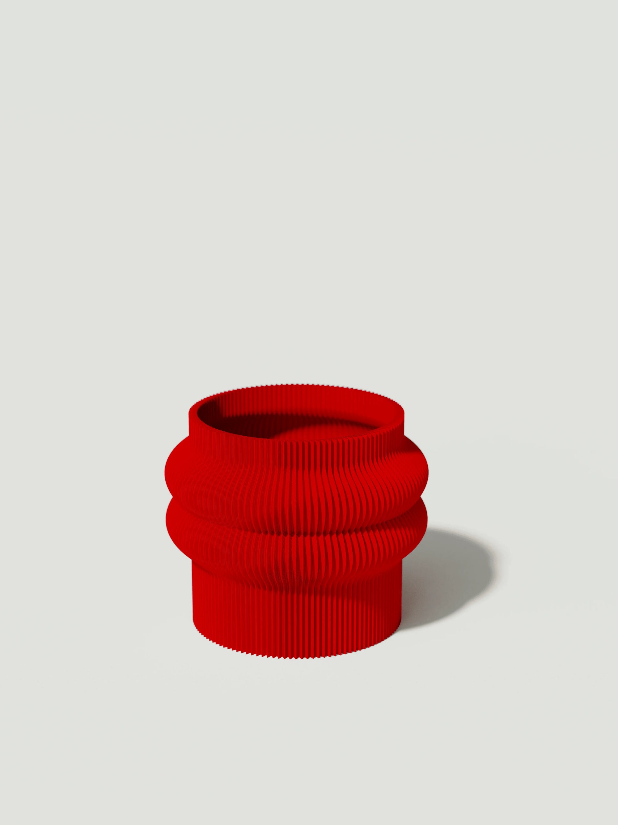 Mooie - Vaso elegante e sostenibile, realizzato in 100% PLA biodegradabile, stampato in 3D e Made in Italy. Il suo design raffinato ed ecologico in rosso aggiunge un tocco di stile e sostenibilità a qualsiasi ambiente.
