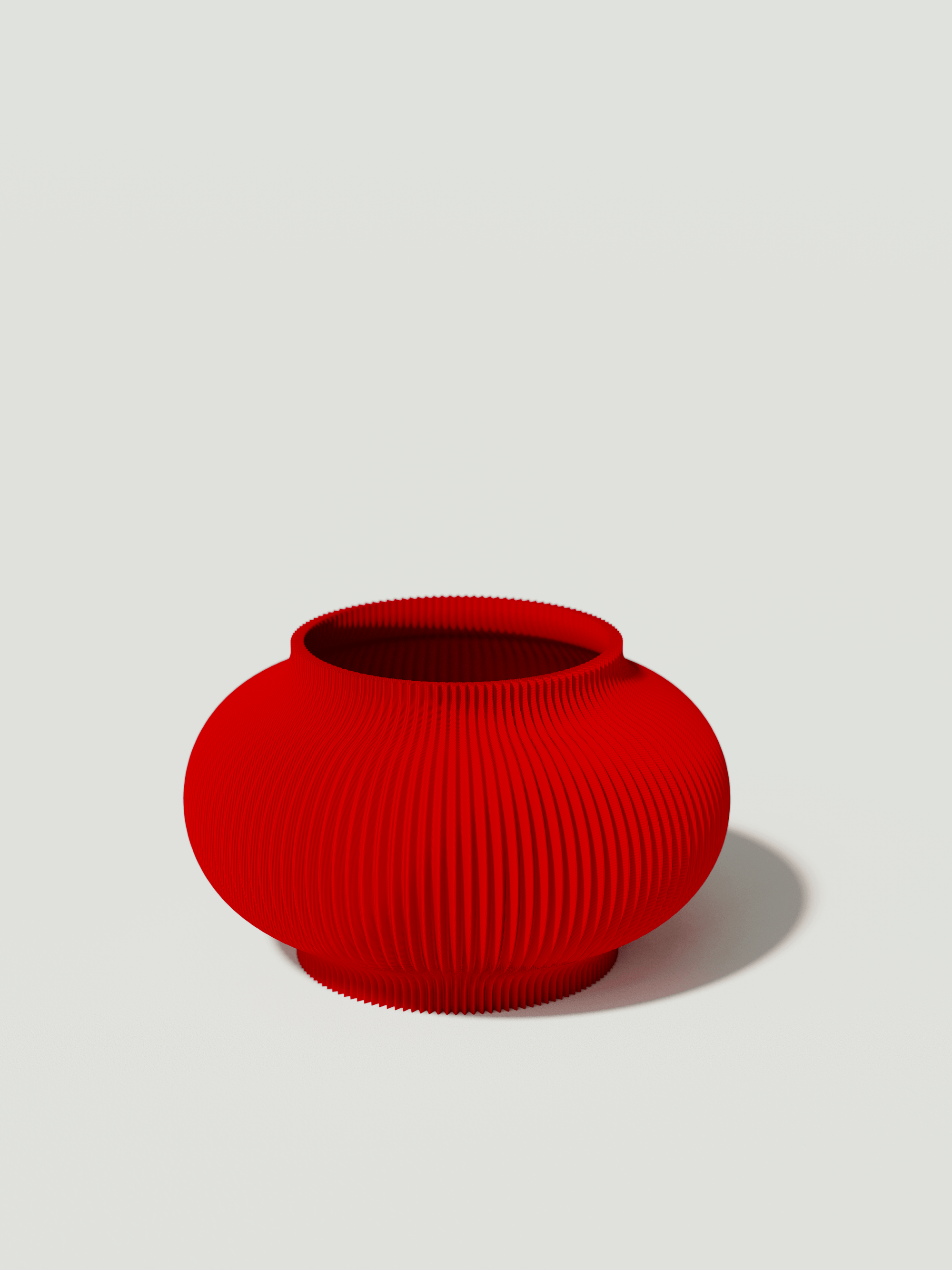 Bao - Vaso elegante e sostenibile, realizzato in 100% PLA biodegradabile, stampato in 3D e Made in Italy. Il suo design raffinato ed ecologico in rosso aggiunge un tocco di stile e sostenibilità a qualsiasi ambiente.