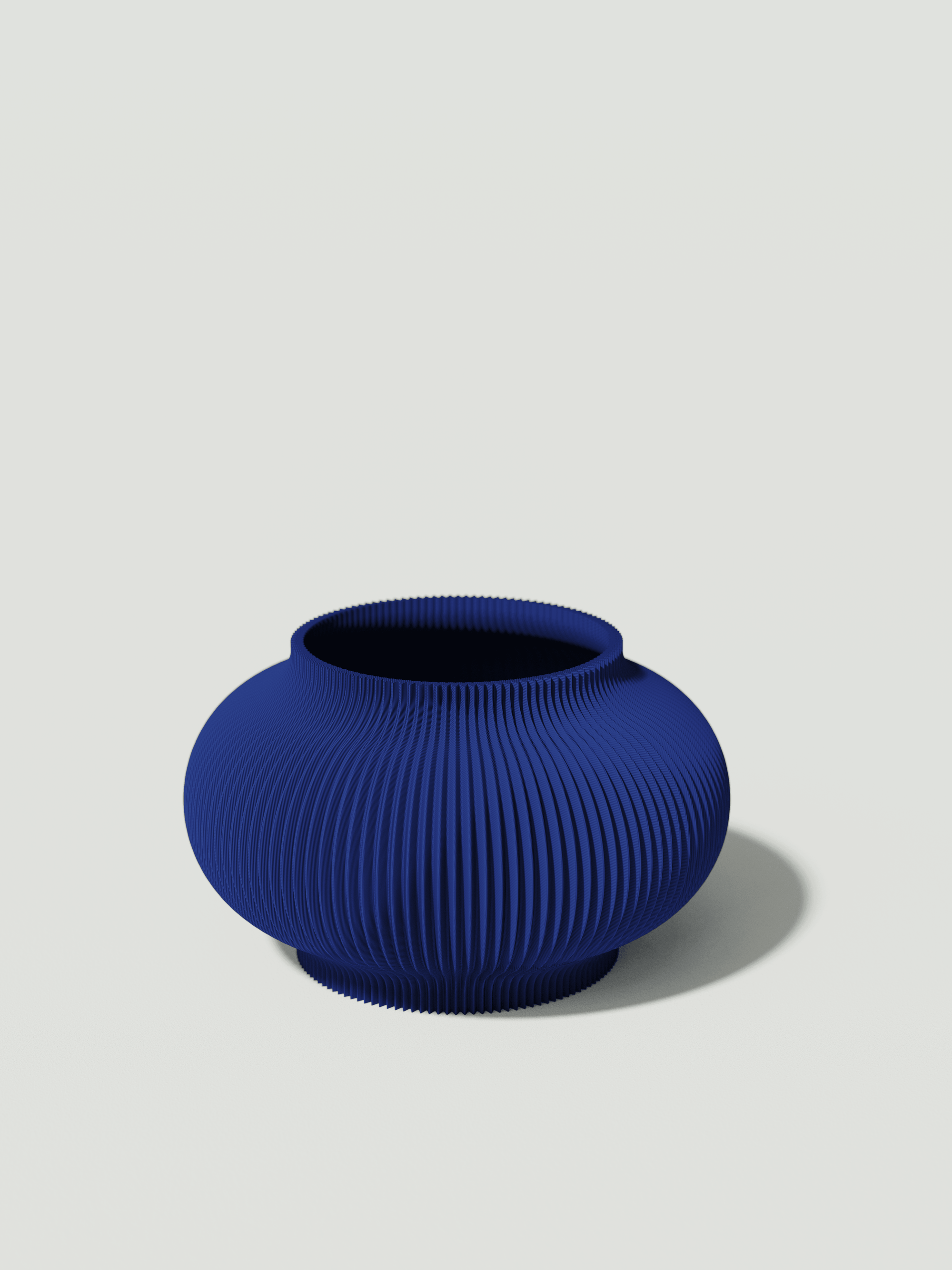 Bao - Vaso elegante e sostenibile, realizzato in 100% PLA biodegradabile, stampato in 3D e Made in Italy. Il suo design raffinato ed ecologico in blue aggiunge un tocco di stile e sostenibilità a qualsiasi ambiente.