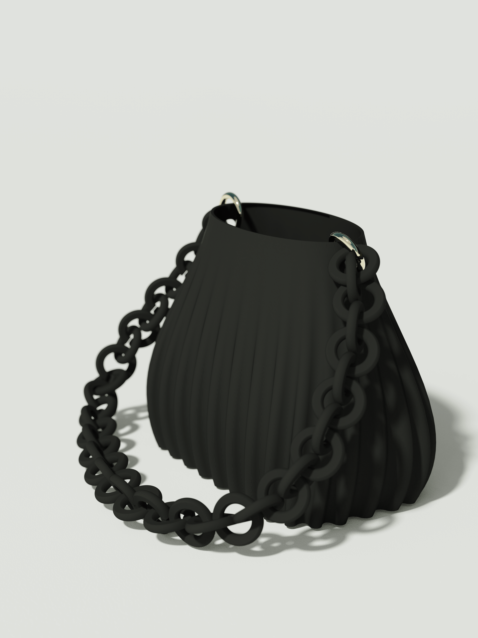 Ariel - Borsa innovativa e sostenibile, realizzata in 100% PLA biodegradabile, stampata in 3D e Made in Italy. Il suo design moderno ed elegante in nero la rende perfetta per chi ama lo stile senza rinunciare alla sostenibilità.