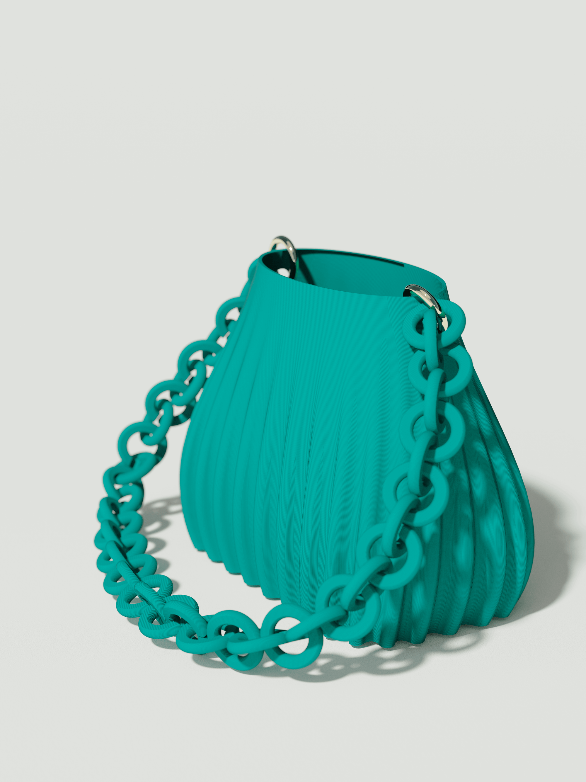Ariel - Borsa innovativa e sostenibile, realizzata in 100% PLA biodegradabile, stampata in 3D e Made in Italy. Il suo design moderno ed elegante in verde petrolio la rende perfetta per chi ama lo stile senza rinunciare alla sostenibilità.
