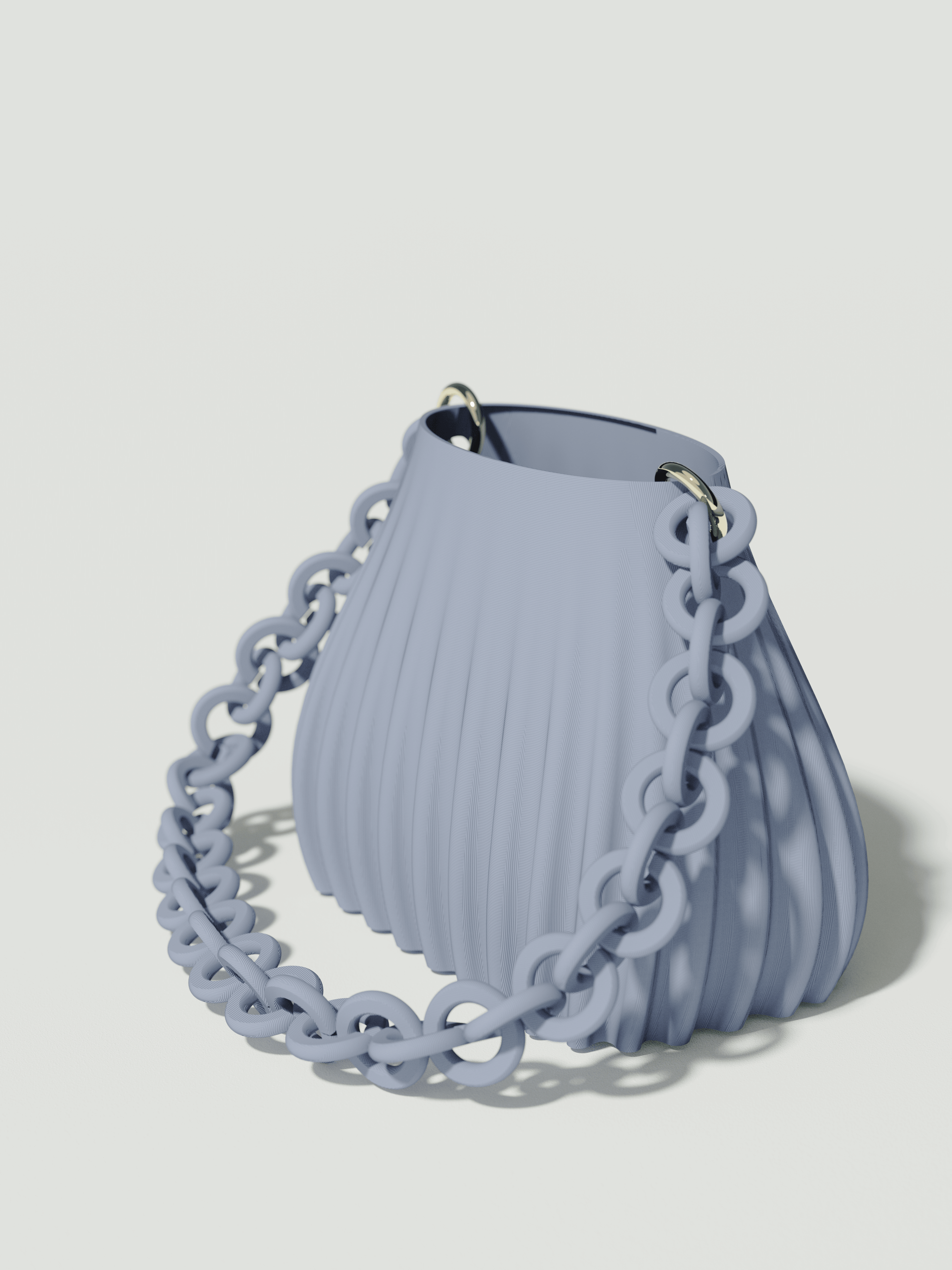 Ariel - Borsa innovativa e sostenibile, realizzata in 100% PLA biodegradabile, stampata in 3D e Made in Italy. Il suo design moderno ed elegante in celeste la rende perfetta per chi ama lo stile senza rinunciare alla sostenibilità.