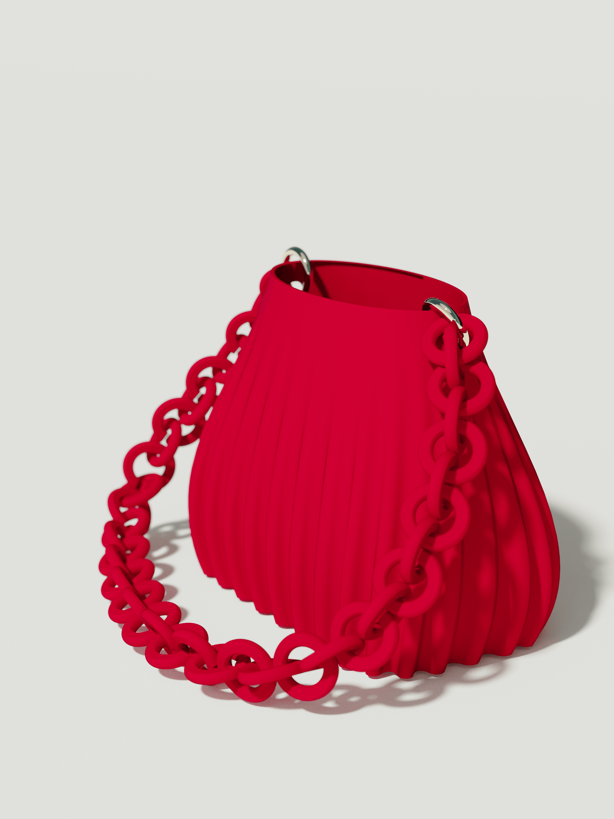 Ariel - Borsa innovativa e sostenibile, realizzata in 100% PLA biodegradabile, stampata in 3D e Made in Italy. Il suo design moderno ed elegante in rosso la rende perfetta per chi ama lo stile senza rinunciare alla sostenibilità.