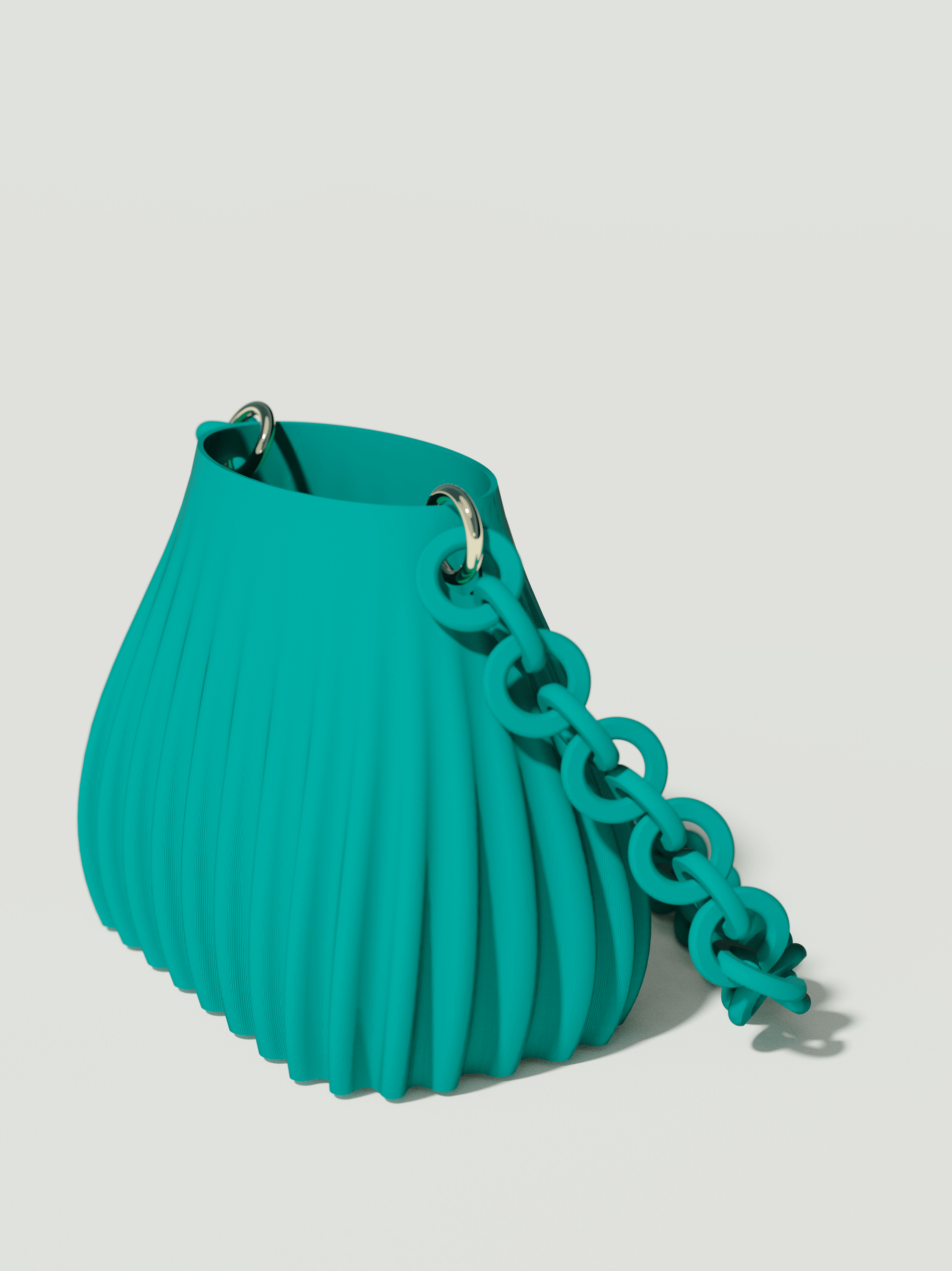 Ariel - Borsa innovativa e sostenibile, realizzata in 100% PLA biodegradabile, stampata in 3D e Made in Italy. Il suo design moderno ed elegante in verde petrolio la rende perfetta per chi ama lo stile senza rinunciare alla sostenibilità.