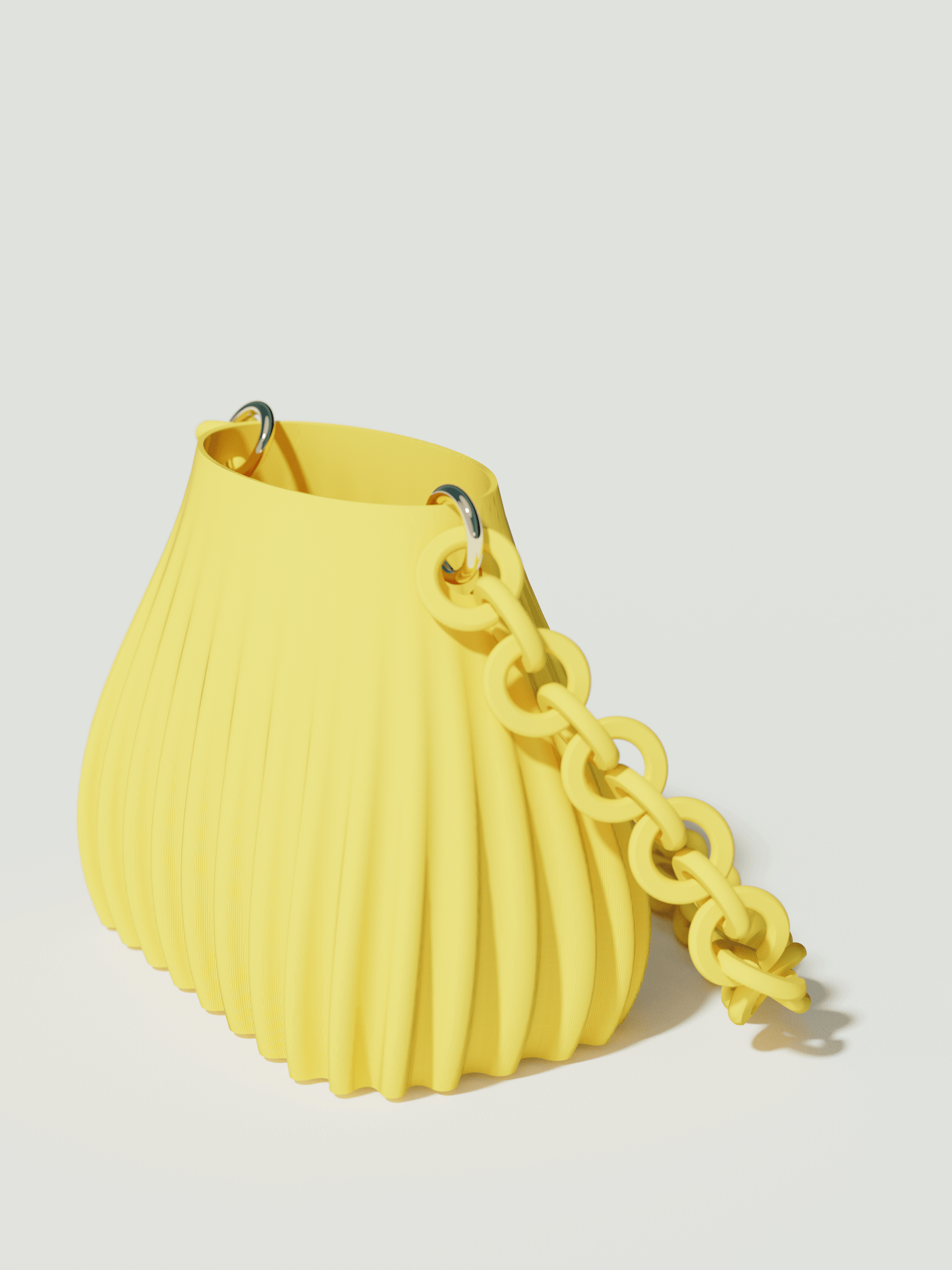 Ariel - Borsa innovativa e sostenibile, realizzata in 100% PLA biodegradabile, stampata in 3D e Made in Italy. Il suo design moderno ed elegante in giallo la rende perfetta per chi ama lo stile senza rinunciare alla sostenibilità.
