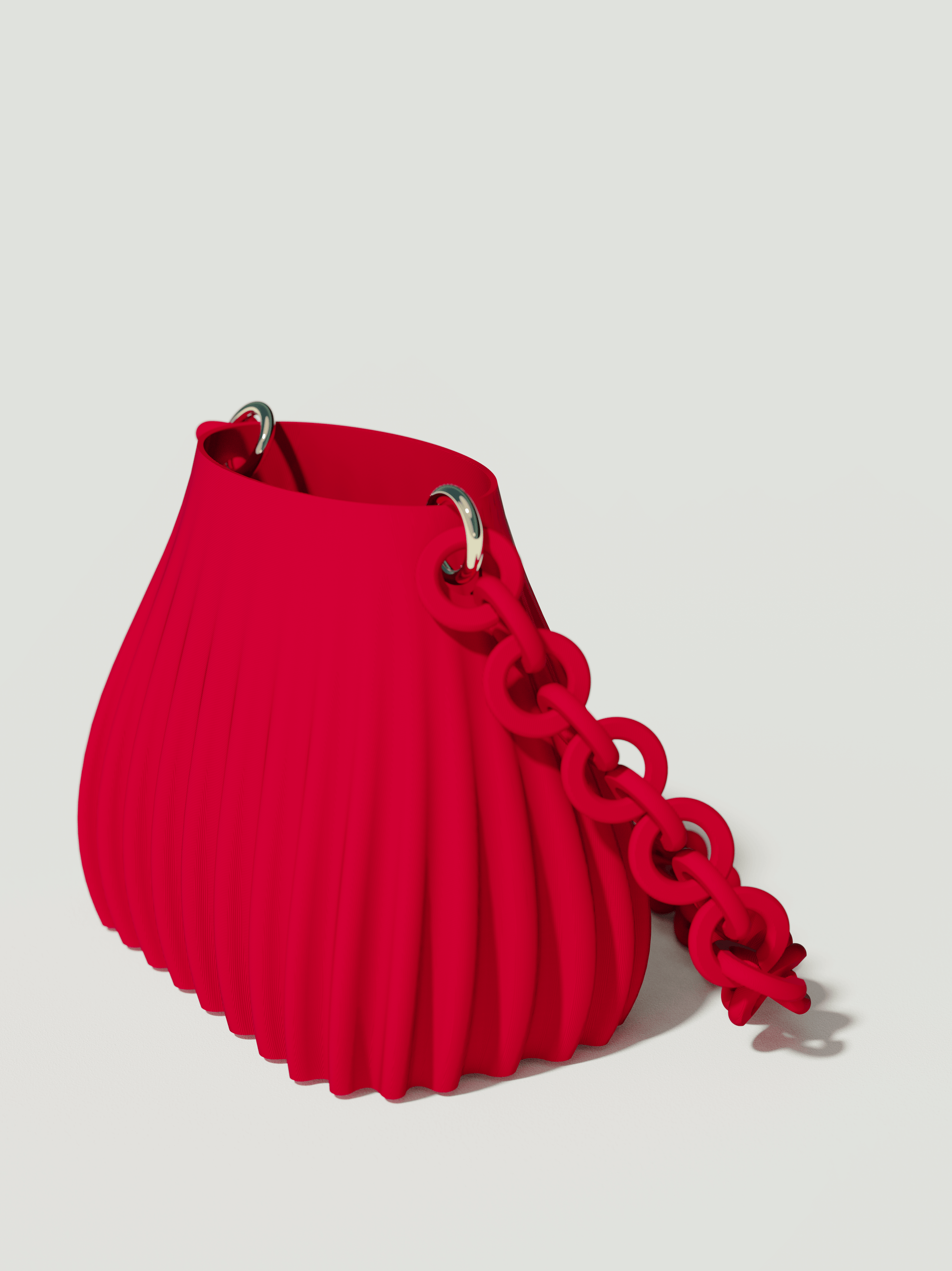 Ariel - Borsa innovativa e sostenibile, realizzata in 100% PLA biodegradabile, stampata in 3D e Made in Italy. Il suo design moderno ed elegante in rosso la rende perfetta per chi ama lo stile senza rinunciare alla sostenibilità.