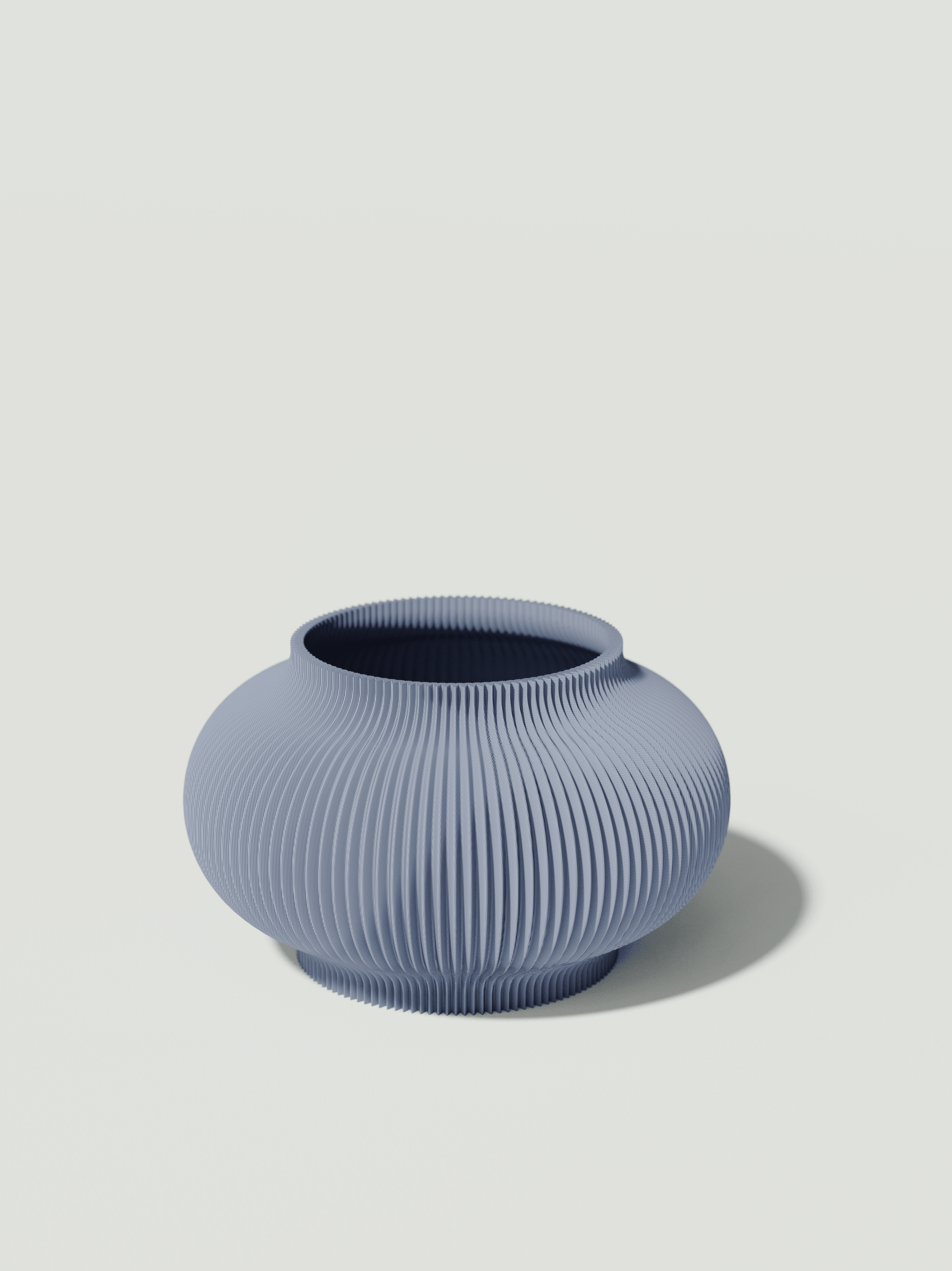 Bao - Vaso elegante e sostenibile, realizzato in 100% PLA biodegradabile, stampato in 3D e Made in Italy. Il suo design raffinato ed ecologico in celeste aggiunge un tocco di stile e sostenibilità a qualsiasi ambiente.