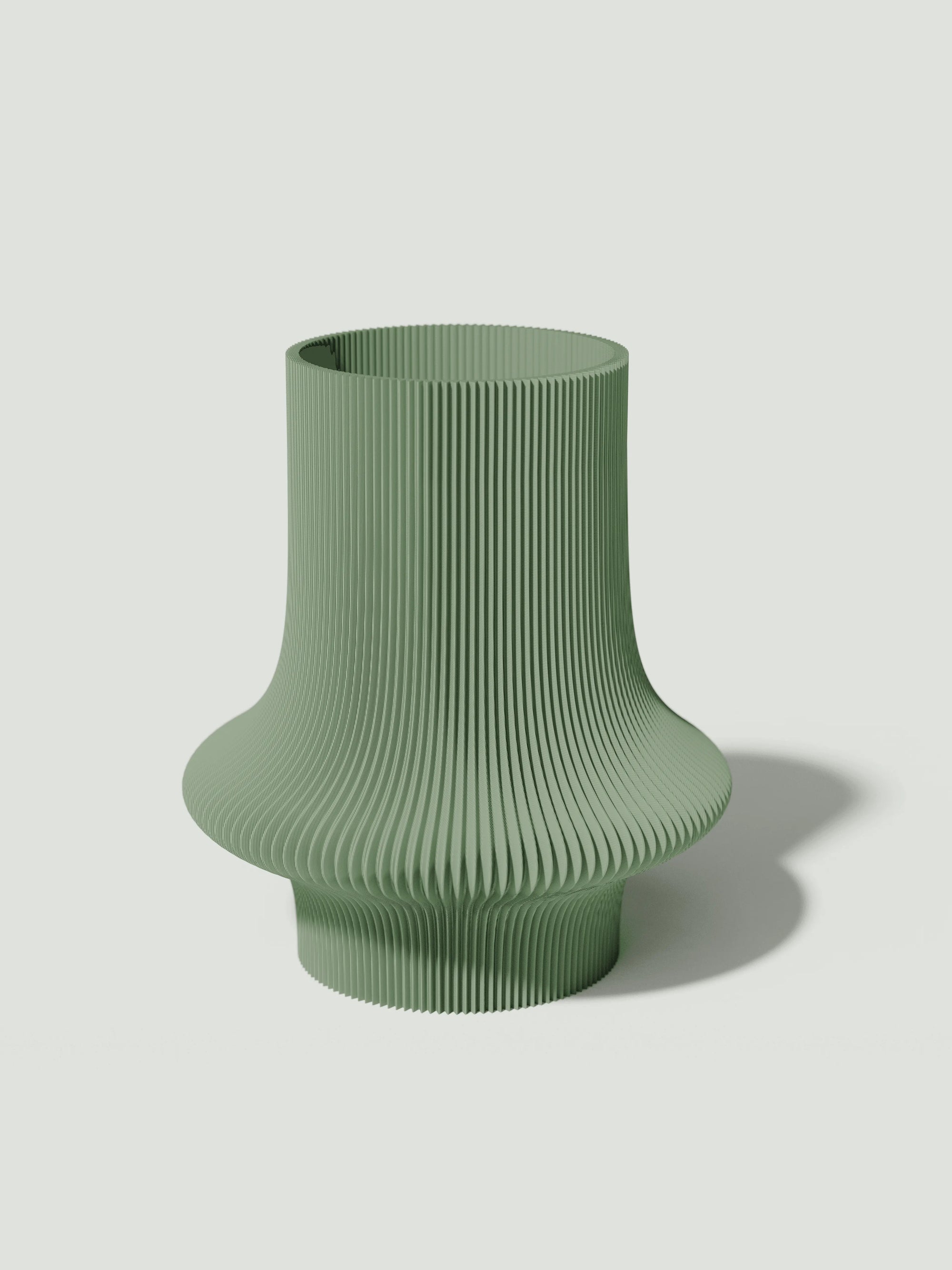 Vio - Vaso elegante e sostenibile, realizzato in 100% PLA biodegradabile, stampato in 3D e Made in Italy. Il suo design raffinato ed ecologico in verde aggiunge un tocco di stile e sostenibilità a qualsiasi ambiente.