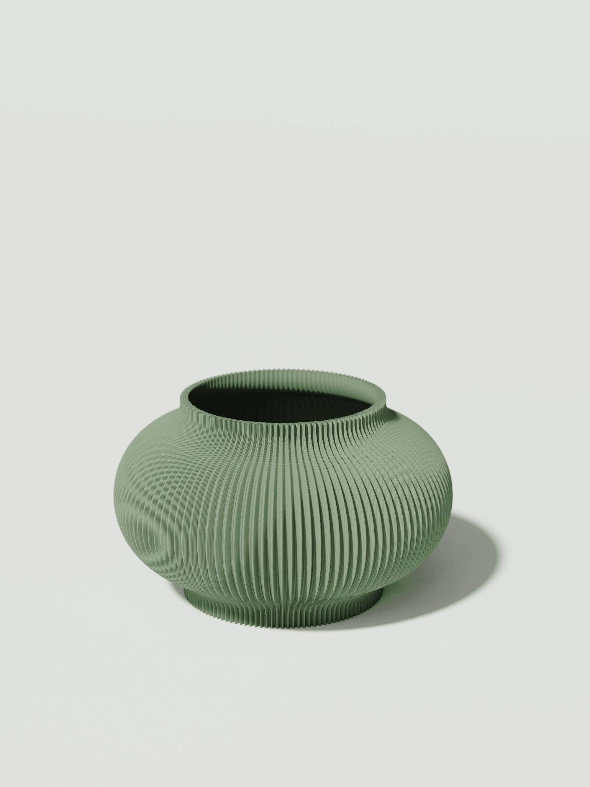 Bao -  Vaso elegante e sostenibile, realizzato in 100% PLA biodegradabile, stampato in 3D e Made in Italy. Il suo design raffinato ed ecologico in verde aggiunge un tocco di stile e sostenibilità a qualsiasi ambiente.