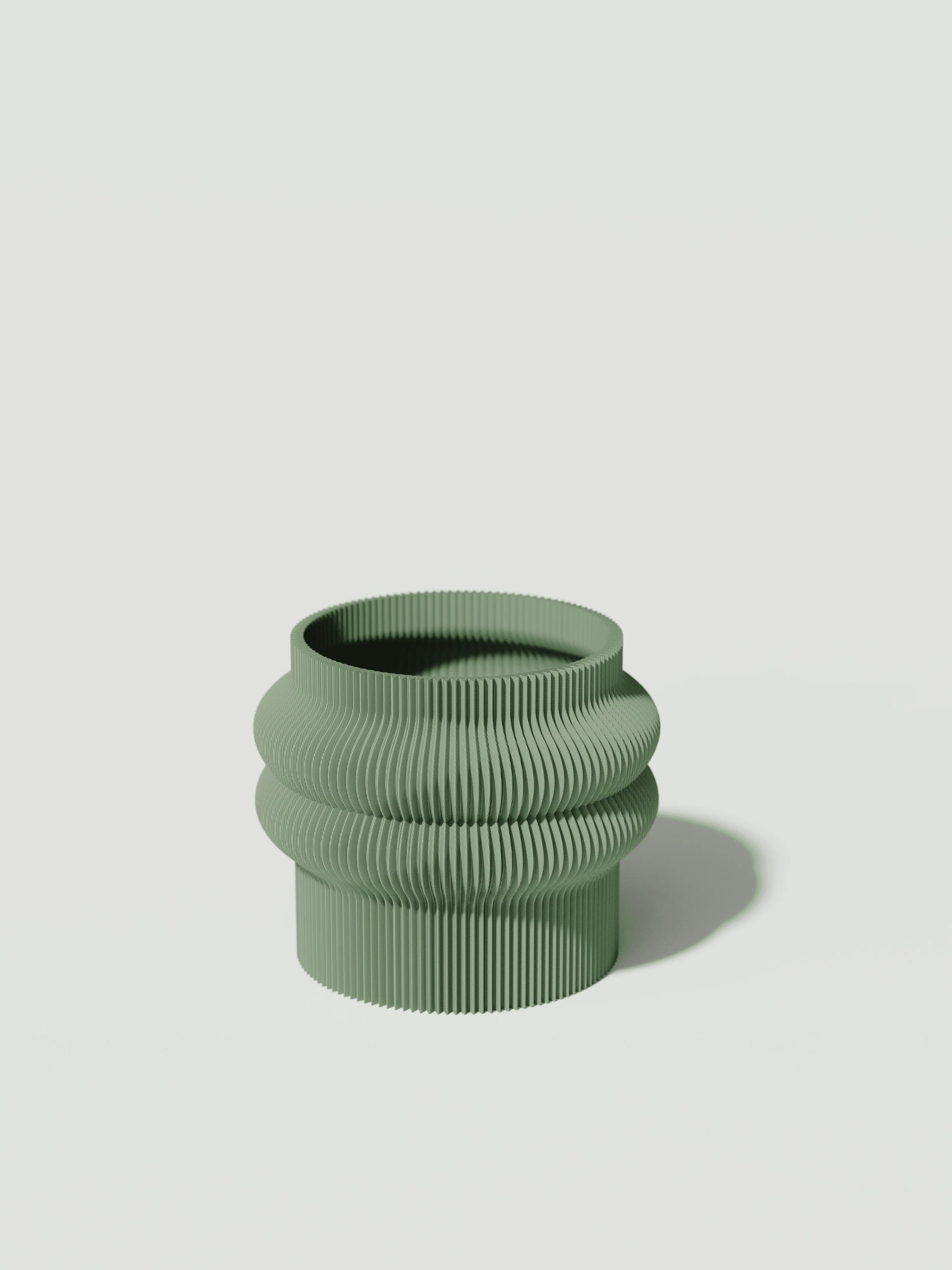 Mooie - Vaso elegante e sostenibile, realizzato in 100% PLA biodegradabile, stampato in 3D e Made in Italy. Il suo design raffinato ed ecologico in verde aggiunge un tocco di stile e sostenibilità a qualsiasi ambiente.