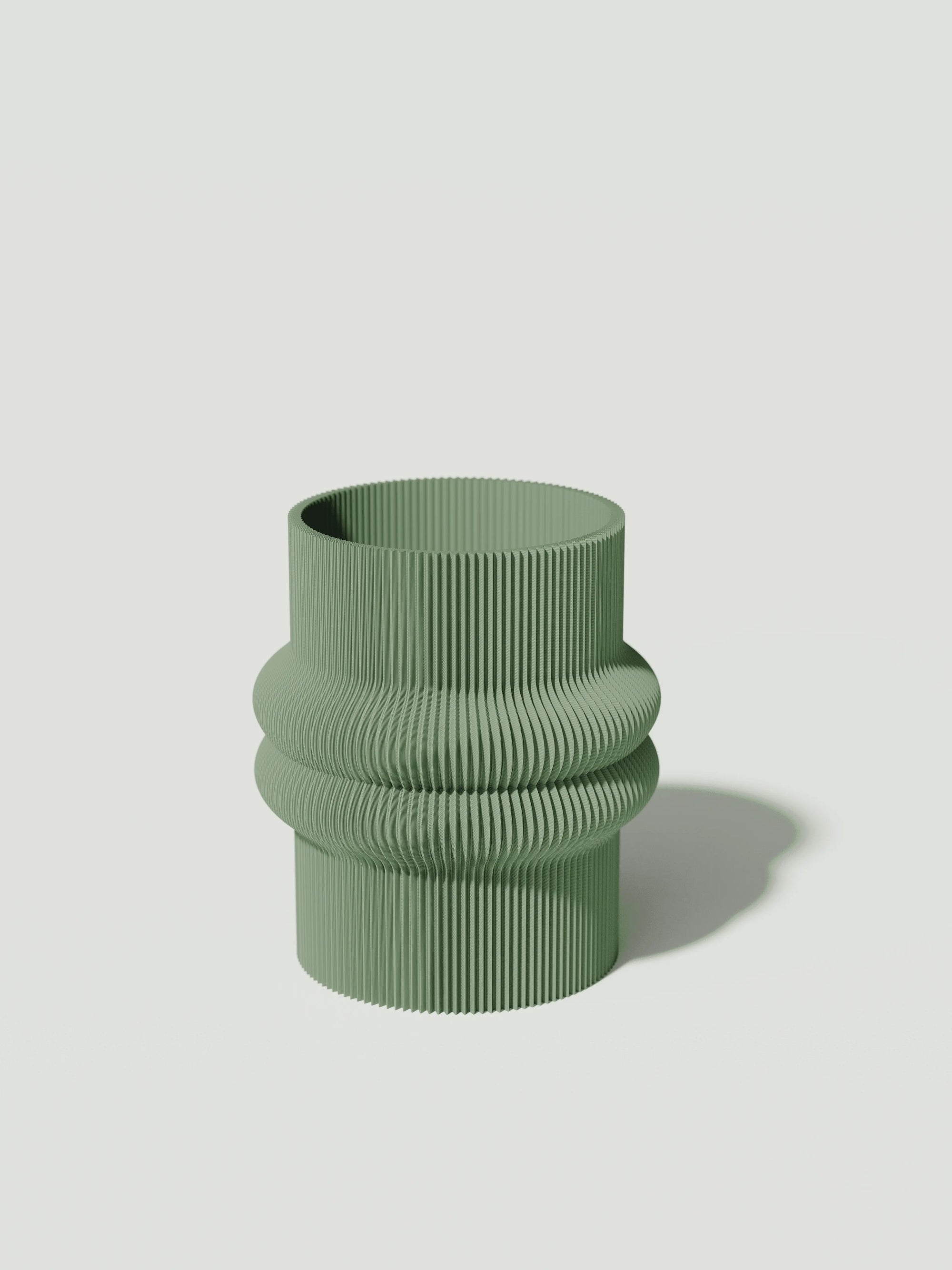 Mooi - Vaso elegante e sostenibile, realizzato in 100% PLA biodegradabile, stampato in 3D e Made in Italy. Il suo design raffinato ed ecologico in verde aggiunge un tocco di stile e sostenibilità a qualsiasi ambiente.