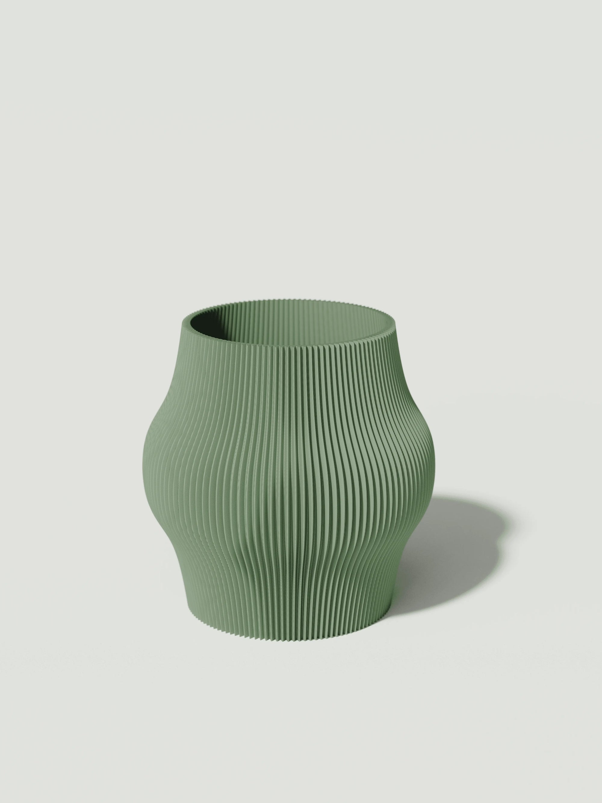 Gordo - Vaso elegante e sostenibile, realizzato in 100% PLA biodegradabile, stampato in 3D e Made in Italy. Il suo design raffinato ed ecologico in verde aggiunge un tocco di stile e sostenibilità a qualsiasi ambiente.