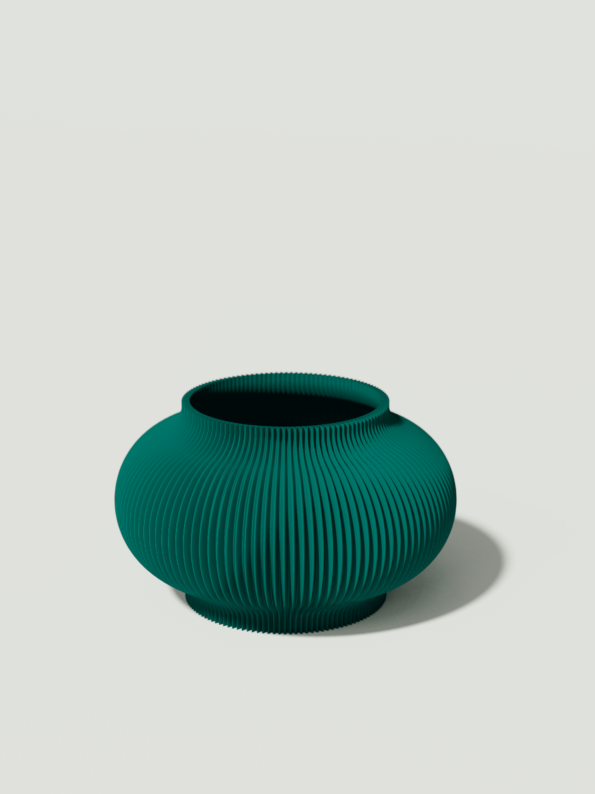 Bao - Vaso elegante e sostenibile, realizzato in 100% PLA biodegradabile, stampato in 3D e Made in Italy. Il suo design raffinato ed ecologico in verde petrolio aggiunge un tocco di stile e sostenibilità a qualsiasi ambiente.